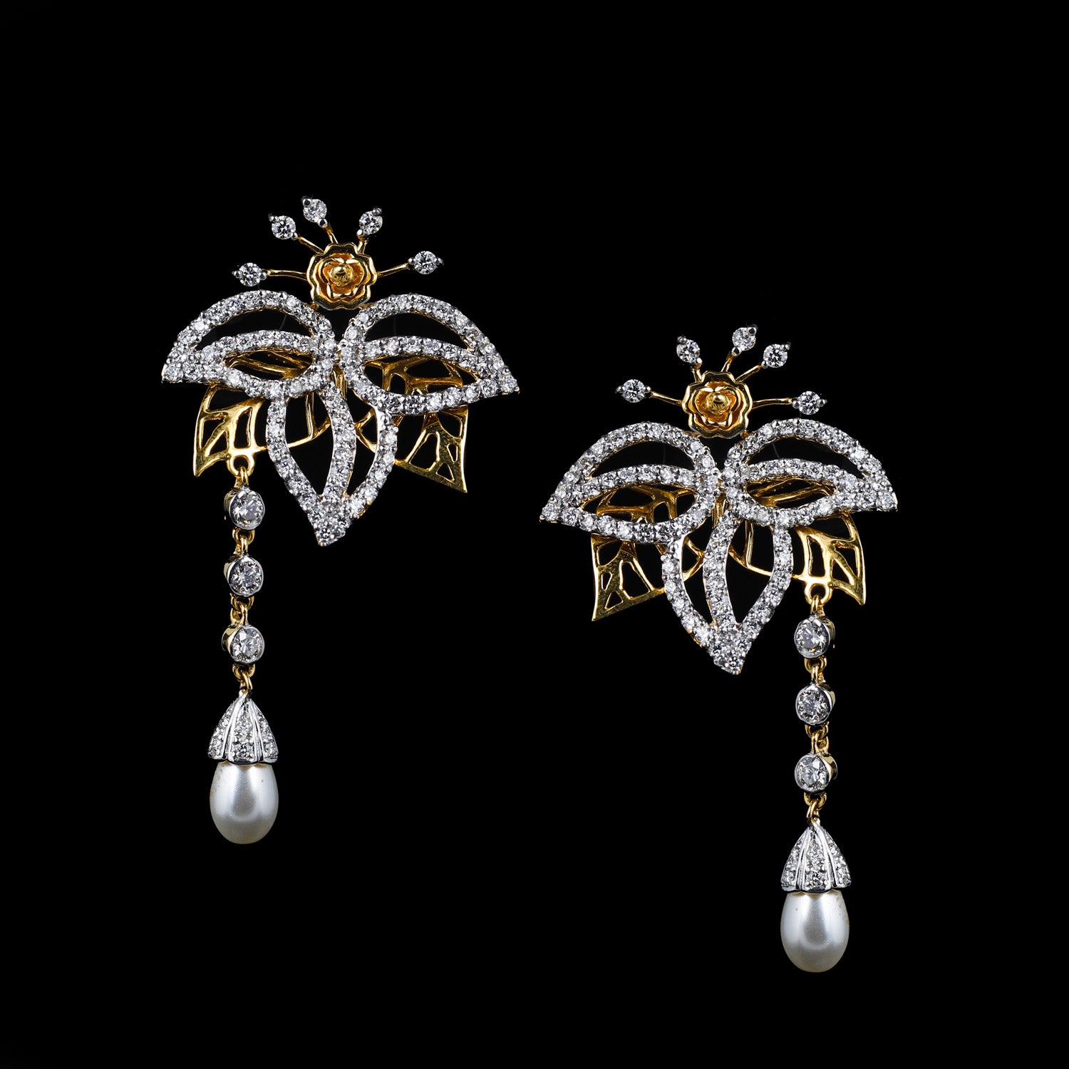 Twisting Gold Diamond Drop Earrings